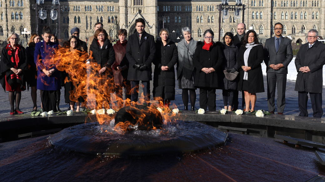 No title Prime Minister Justin Trudeau and members of Cabinet lay flowers in remembrance of the victims of the École Polytechnique de Montréal.