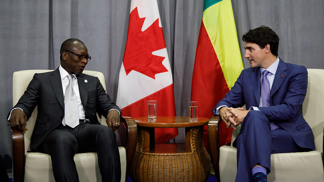 PM Trudeau sits and talks with President Patrice Talon