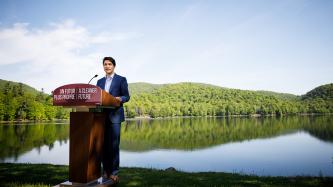 PM Trudeau speaks at the podium