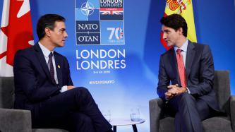 PM Justin Trudeau sits with the PM of Spain, Pedro Sánchez