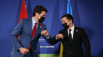 President Volodymyr Zelenskyy and Prime Minister Justin Trudeau exchange an elbow bump