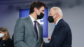 Prime Minister Trudeau and President Biden exchange an elbow bump
