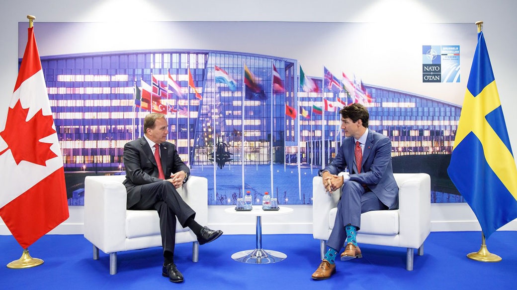 PM Trudeau sits and talks with the Prime Minister of Sweden.
