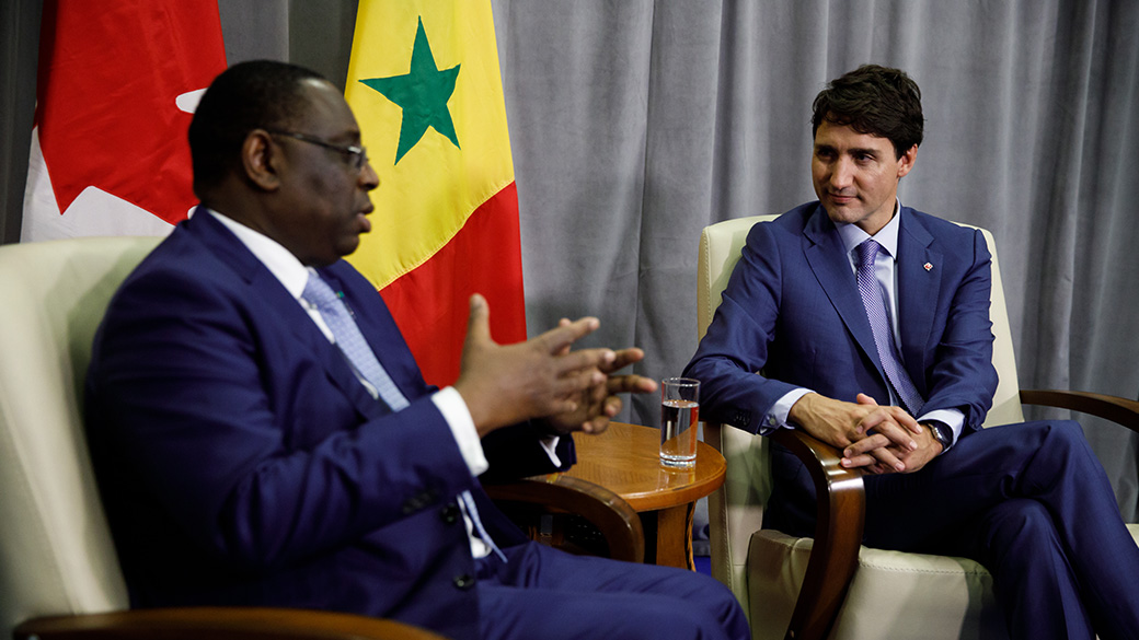 No title PM Trudeau sits and talks with President Macky Sall