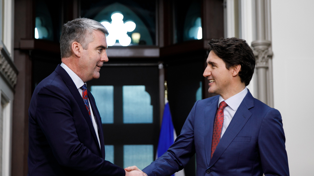 Prime Minister Trudeau shakes hands with Nova Scotia Premier McNeil