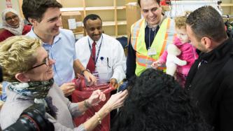 Photo number 2 from the photo gallery Prime Minister Justin Trudeau welcomes Syrian refugees to Canada at the Toronto Pearson International Airport