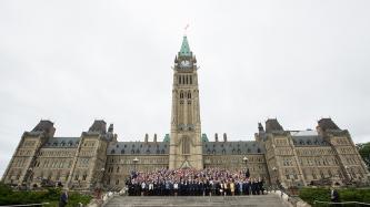 Photo number 1 from the photo gallery Prime Minister Justin Trudeau joins all Members of Parliament and Senators in a photo to commemorate the 150th anniversary of Parliament