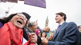 Photo number 3 from the photo gallery Prime Minister Justin Trudeau joins all Members of Parliament and Senators in a photo to commemorate the 150th anniversary of Parliament