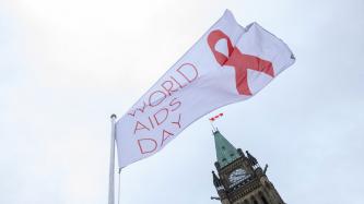 Photo number 3 from the photo gallery Prime Minister Justin Trudeau helps to raise the World AIDS Day flag on Parliament Hill