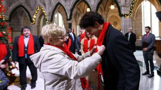 Photo number 4 from the photo gallery Prime Minister Justin Trudeau helps to raise the World AIDS Day flag on Parliament Hill