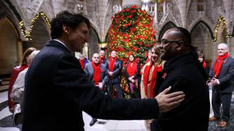 Photo number 5 from the photo gallery Prime Minister Justin Trudeau helps to raise the World AIDS Day flag on Parliament Hill