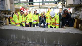 Photo number 3 from the photo gallery Prime Minister Justin Trudeau places the last stone during the restoration of West Block on Parliament Hill