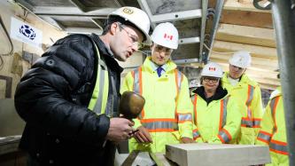 Photo number 4 from the photo gallery Prime Minister Justin Trudeau places the last stone during the restoration of West Block on Parliament Hill