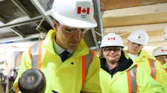 Photo number 7 from the photo gallery Prime Minister Justin Trudeau places the last stone during the restoration of West Block on Parliament Hill