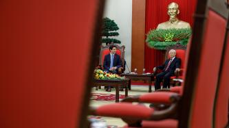 Prime Minister Justin Trudeau sits and meets with the Secretary General of the Communist Party of Vietnam, Nguyễn Phú Trọng