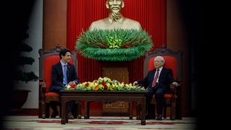 Prime Minister Justin Trudeau sits and meets with the Secretary General of the Communist Party of Vietnam, Nguyễn Phú Trọng