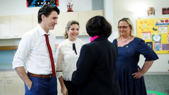 Prime Minister Justin Trudeau and Sophie Grégoire Trudeau speak with members of the YWCA Crabtree Corner Community Resource Centre