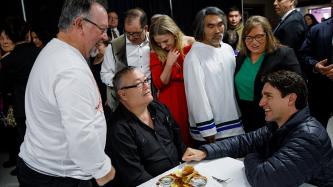 Prime Minister Trudeau laughs with attendees