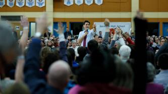 Prime Minister Justin Trudeau asks the crowd for questions