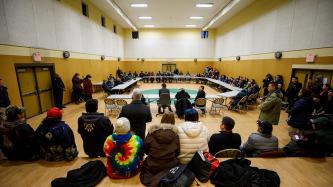 Prime Minister Justin Trudeau participates in a public discussion with community elders of Pikangikum.