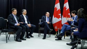 Prime Minister Justin Trudeau meets with Axel Weber, Chairman of UBS, and other business leaders.