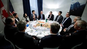 Prime Minister Justin Trudeau and Minister Maryam Monsef take part in a Canada-U.S.A. economic roundtable discussion.