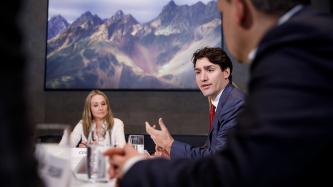 Prime Minister Justin Trudeau takes part in a roundtable discussion.