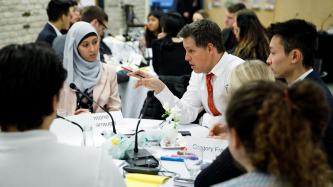MP Peter Schiefke speaks during a roundtable discussion with members of the Prime Minister's Youth Council.