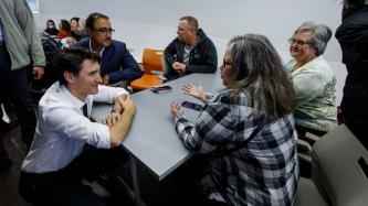 PM Trudeau and Minister Sohi listen to residents