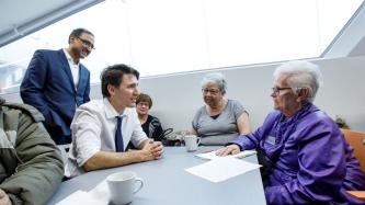 PM Trudeau and Minister Sohi listen to residents