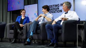 Prime Minister Justin Trudeau, Bill Nye and PhD student Caitlin Miron share a laugh during an armchair discussion at the University of Ottawa  