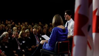 Prime Minister Justin Trudeau addresses the audience during an armchair discussion hosted by Tanya van Biesen, Executive Director of Catalyst Canada.