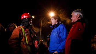 Prime Minister Justin Trudeau and MP Terry Sheehan speak with Algoma steel worker Matt Frolick outside the Direct Strip Production Complex