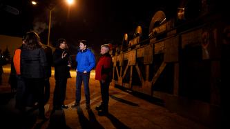 Prime Minister Justin Trudeau and MP Terry Sheehan speak with an Algoma steel worker outside the Direct Strip Production Complex