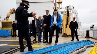 PM Trudeau speaks at the podium
