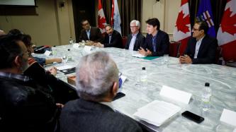 Prime Minister Justin Trudeau speaks during a meeting with the members of First Nation communities alongside Minister Amarjeet Sohi and Minister James Gordon Carr