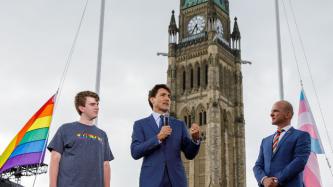 PM Trudeau speaks before the flag raising