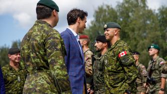 PM Trudeau speaks to Canadian soldier