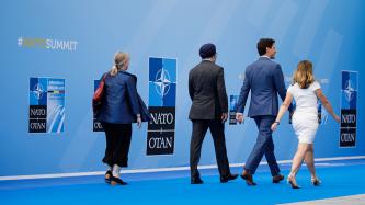 PM Trudeau, Ministers Freeland and Sajjan arrive at the Summit.