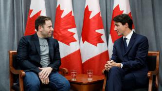PM Trudeau sits and speaks with CEO Jean-François Gagné