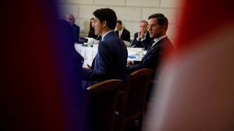 PM Trudeau speaks during a meeting