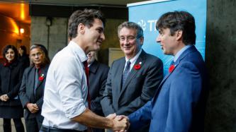 PM Trudeau shakes hands with members of TRIUMF organization