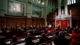 PM Trudeau speaks to attendees in the Senate Chamber