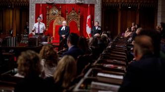 PM Trudeau speaks to attendees in the Senate Chamber