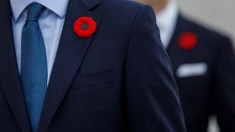 PM Trudeau's lapel with a poppy pinned to it