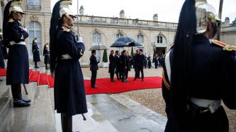 PM Trudeau greets President Macron on the red carpet  