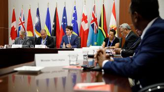 PM Trudeau sits among Pacific Island leaders during meeting
