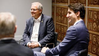 PM Trudeau and PM Scott Morrison pose for photo