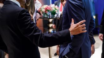 President Peña Nieto holds PM Trudeau by the arm