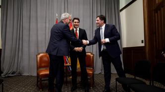 Minister LeBlanc shakes hands with Premier Blaine Higgs